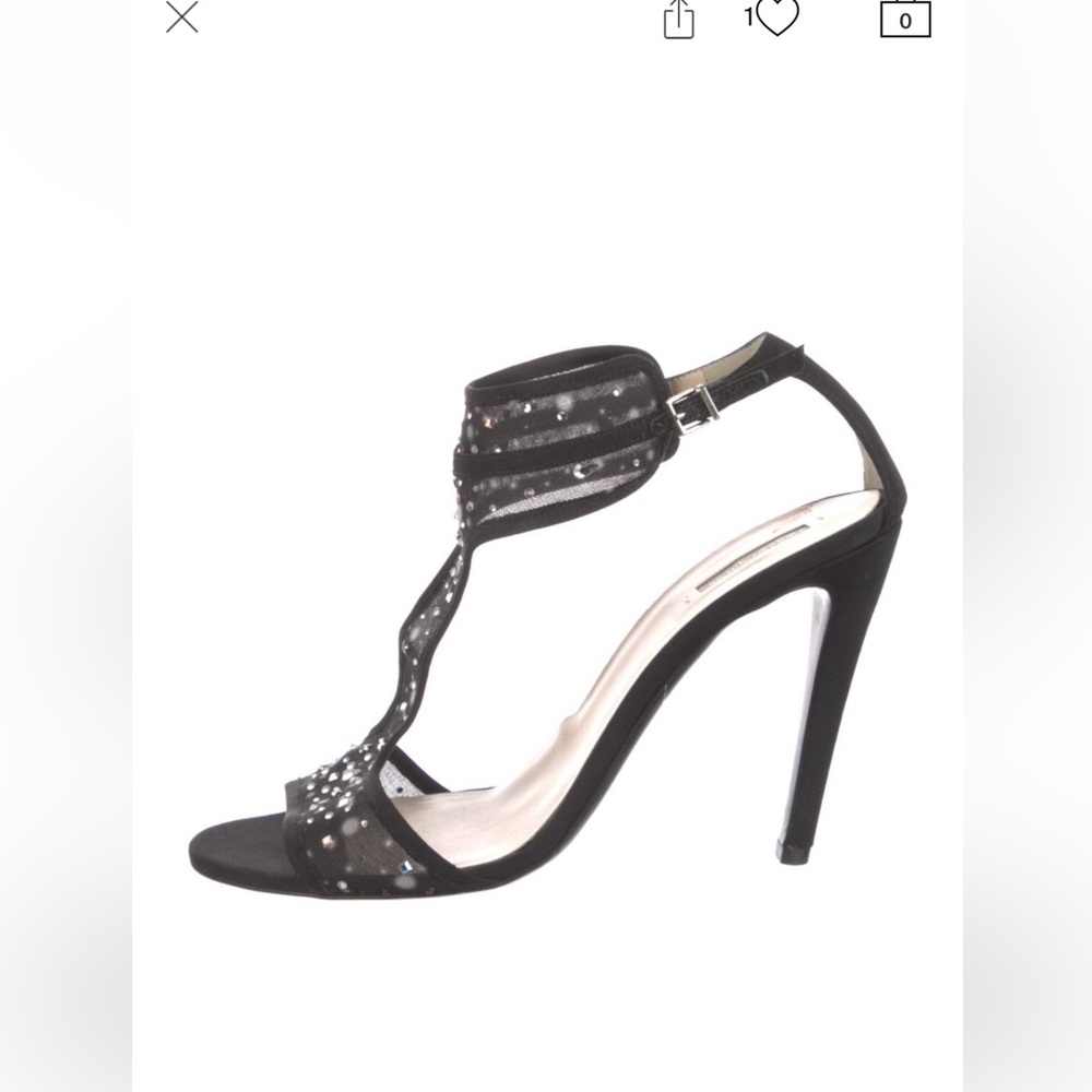 Black Giorgio Armani sandals size 39! 

Pre owned in perfect condition